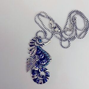 Betsy Johnson necklace, long chain, silver, iridescent, light & dark blue jewels